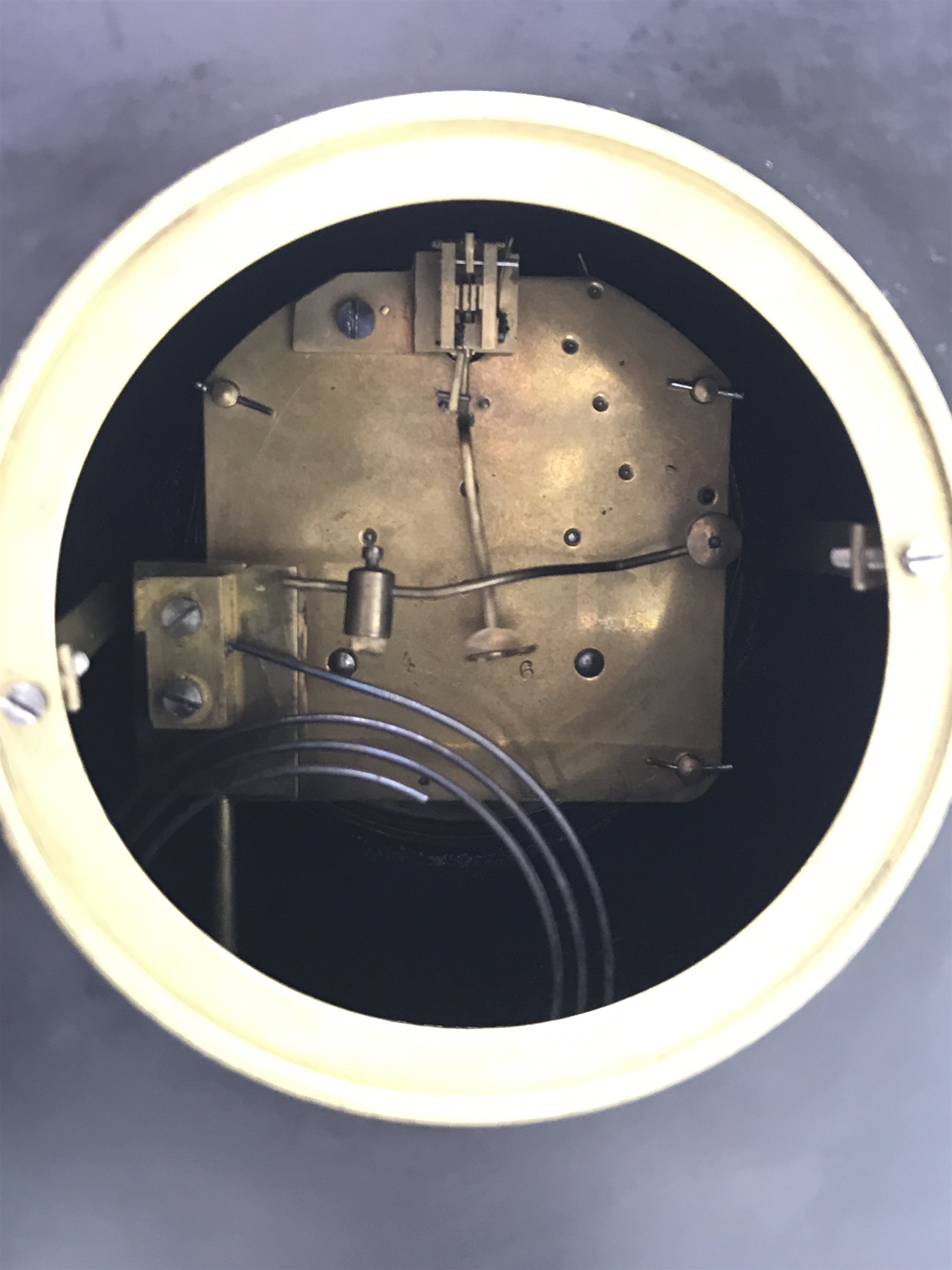 Victorian black slate mantel clock, stepped sloping pediment with marble inset, marble half column pilasters enclosing Arabic dial, twin train movement striking the hours and half on single coil, gilt and painted engraved detail, H35cm