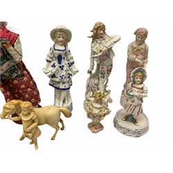 A collection victorian and later figures, including a set of busque male and female with a matt pink glaze, a sitzendorf miniature urn with floral decoration and a Lladro figure. 