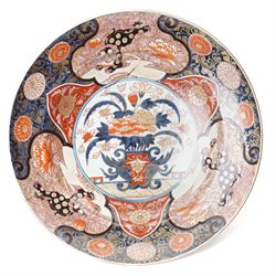 Japanese 18th century Edo period Imari porcelain charger, painted with a central peony in ...