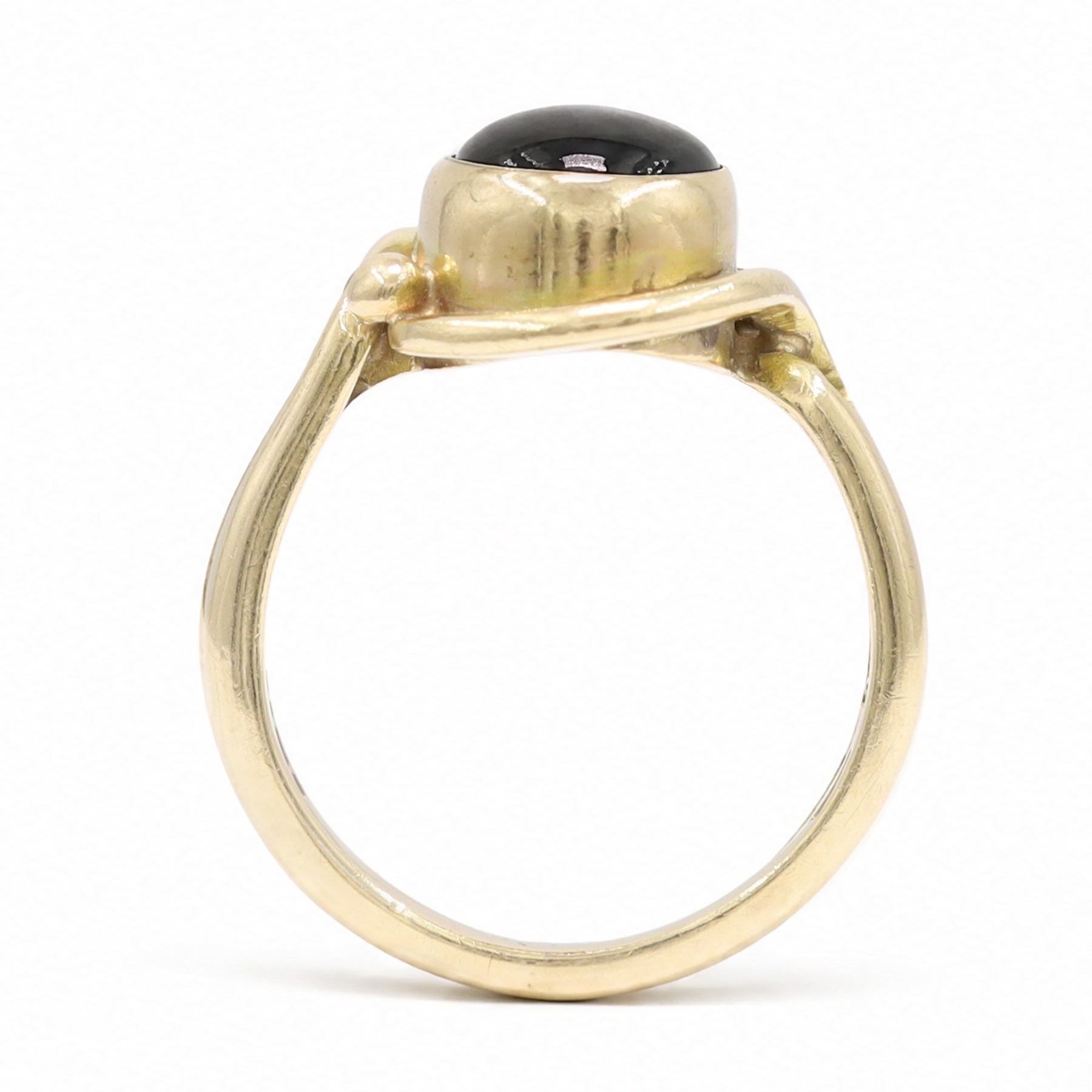 9ct gold black sapphire ring, bezel set with a single cabochon cut sapphire, London 1996