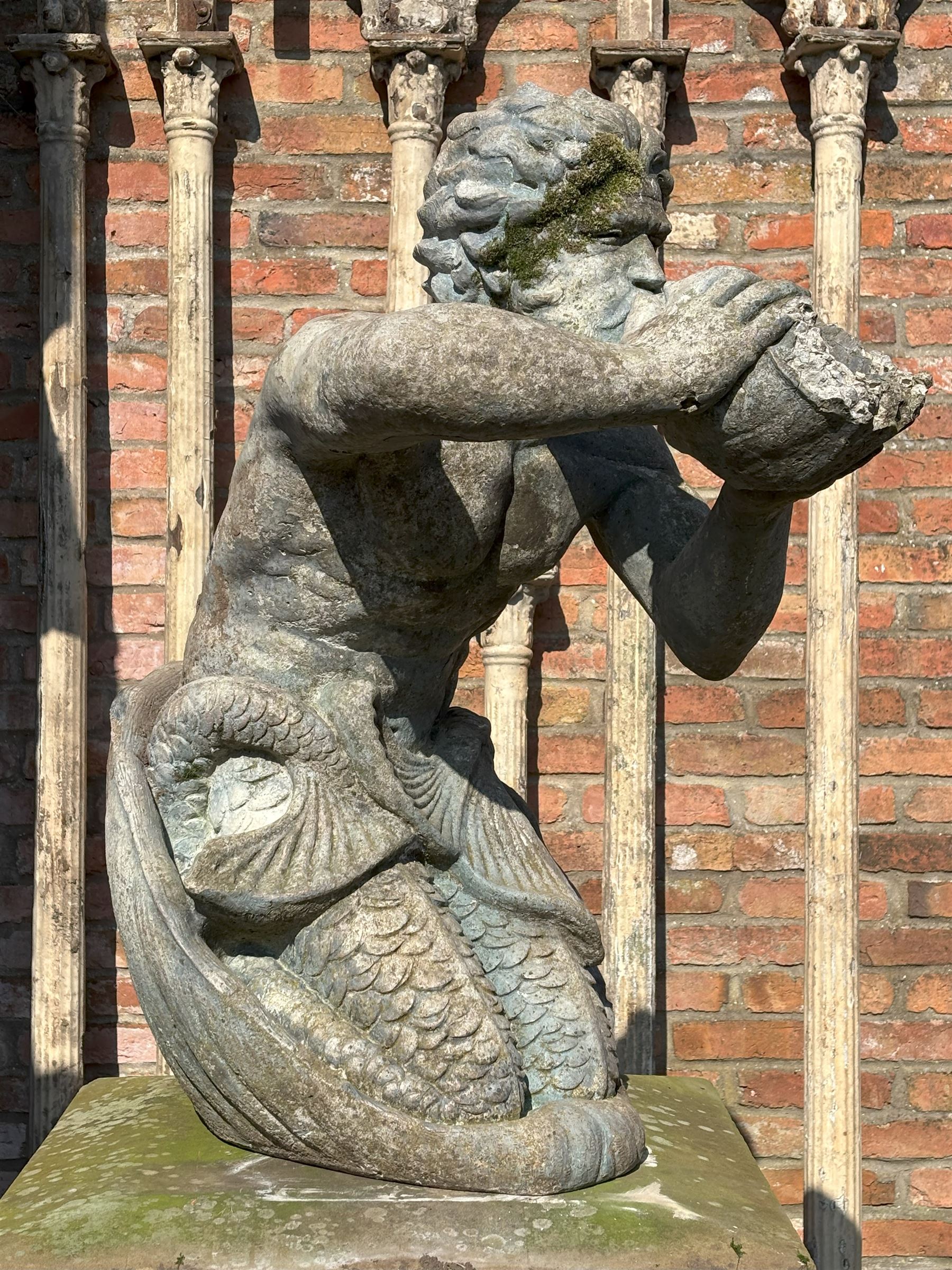 Reconstituted stone garden statue water fountain modelled as Triton, mid 20th century, in characteristic pose. H85cm - COLLECTION BY APPOINTMENT FROM: The White House, Thirsk Road, Easingwold, York, YO61 3NF - CALL 01723 507111 TO ARRANGE