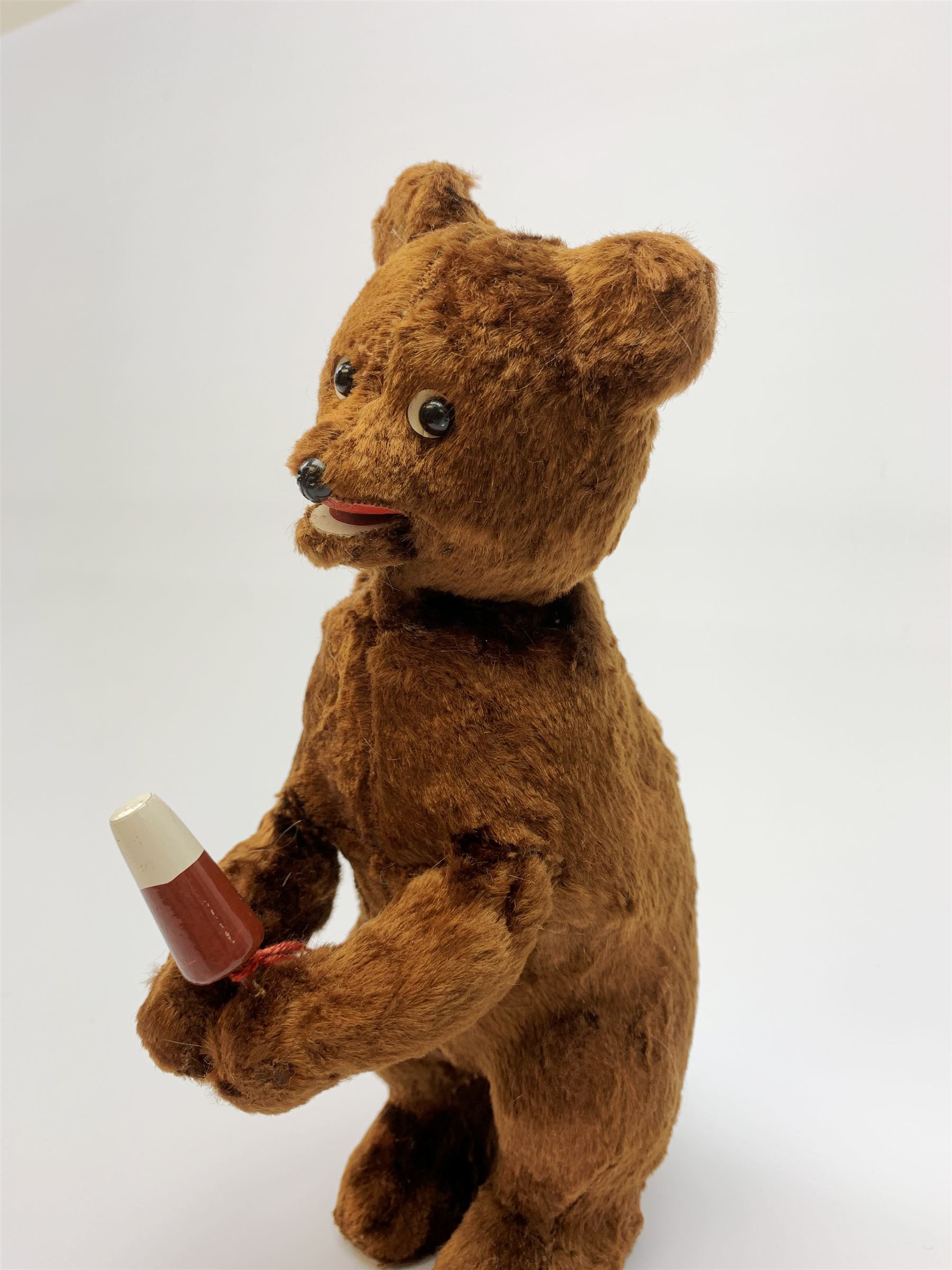 'Meabeab' Russian clockwork plush covered bear c1950s depicted standing with open mouth holding an ice lolly H9