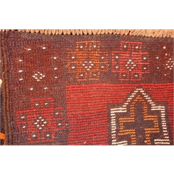  Old Baluchi red ground rug, 220cm x 112cm  