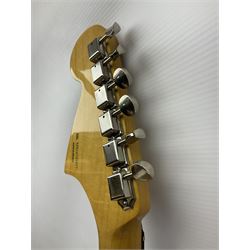 Mexican Fender Jaguar electric guitar with Humbucker pick-ups and tremolo arm, serial no.MX16741977, L101cm; in soft carrying case