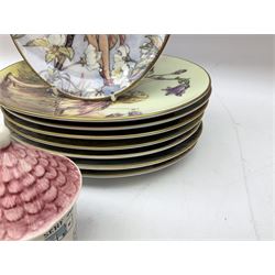 Royal Worcester Flower Fairies oval collectors plates, Goebel mustard pot, two Danbury Mint Fairy Tale bells, and pair of Hutschenreuther candlesticks decorated with scenes of Puss in Boots