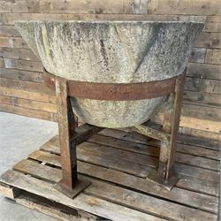 Large 19th century circular stone mortar planter on wrought iron stand