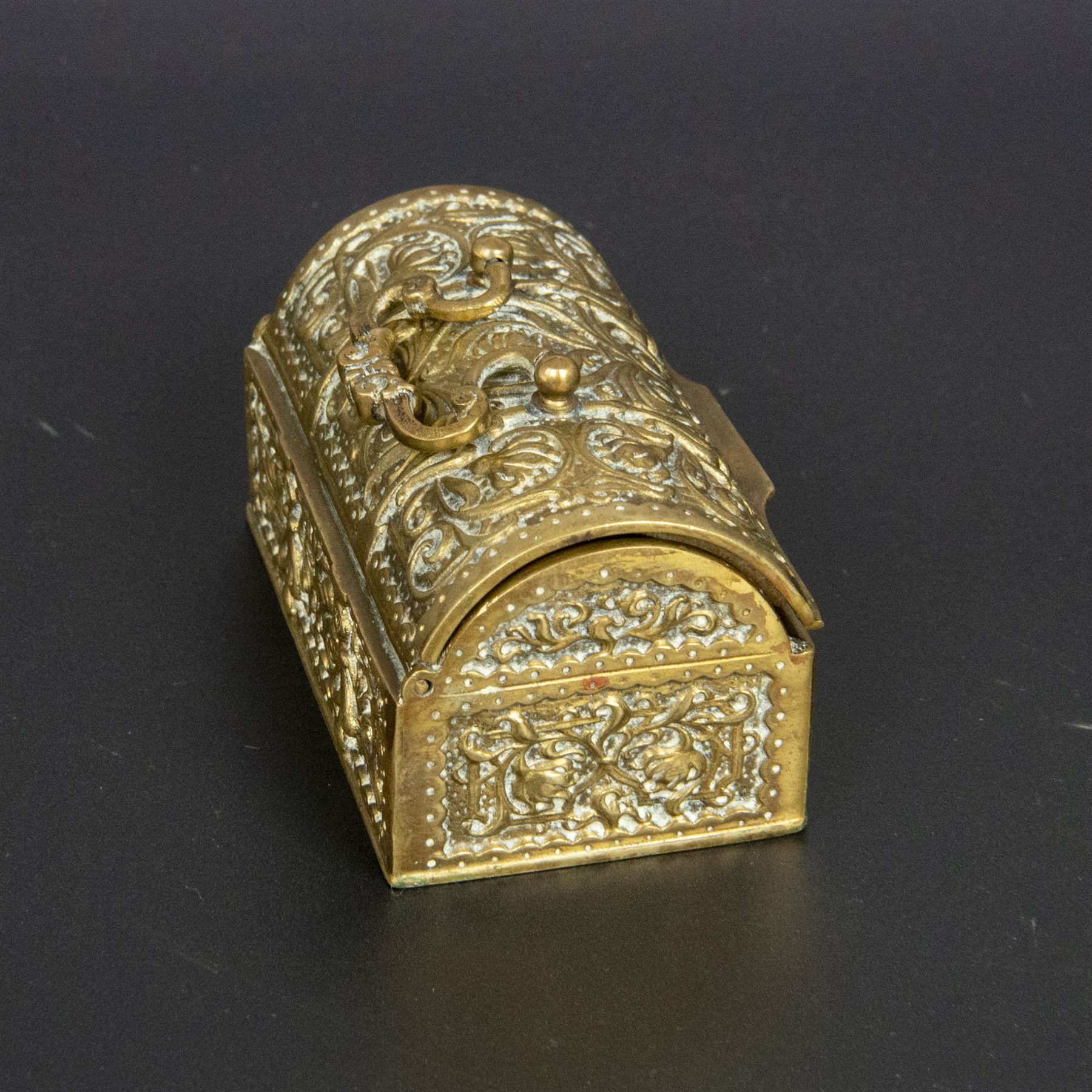 Gilt bronze mounted black glass seal, contained within a brass casket, with velvet interior and inner label reading 'C. F. Schmedding Augsburg', together with a porcelain handled seal decorated with floral sprays on a pink ground