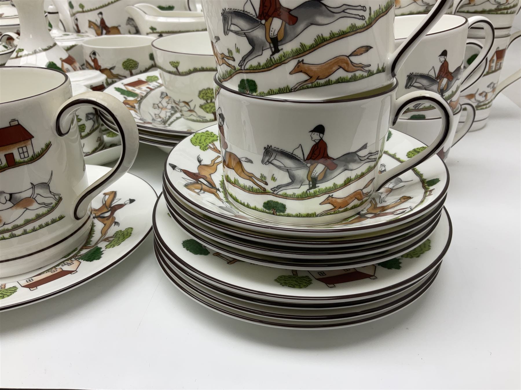 Wedgwood Hunting Scenes dinner and tea service for ten, to include dinner plates, side plates, dessert plates, cups and saucers, mugs, two large teapots, two milk jugs, etc, together with matching items by coalport and Staffordshire (94)