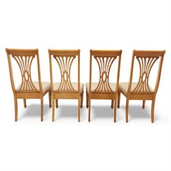 Late 20th century parquetry veneered extending dining table and eight chairs, the rectangular top with canted corners decorated with geometric parquetry panels, moulded edge frieze with repeating carved detail, raised on twin pedestal supports with fluted columns and shaped platform bases, the chairs with pierced splat backs and upholstered drop-in seats
Extends on a central leaf to 208cm