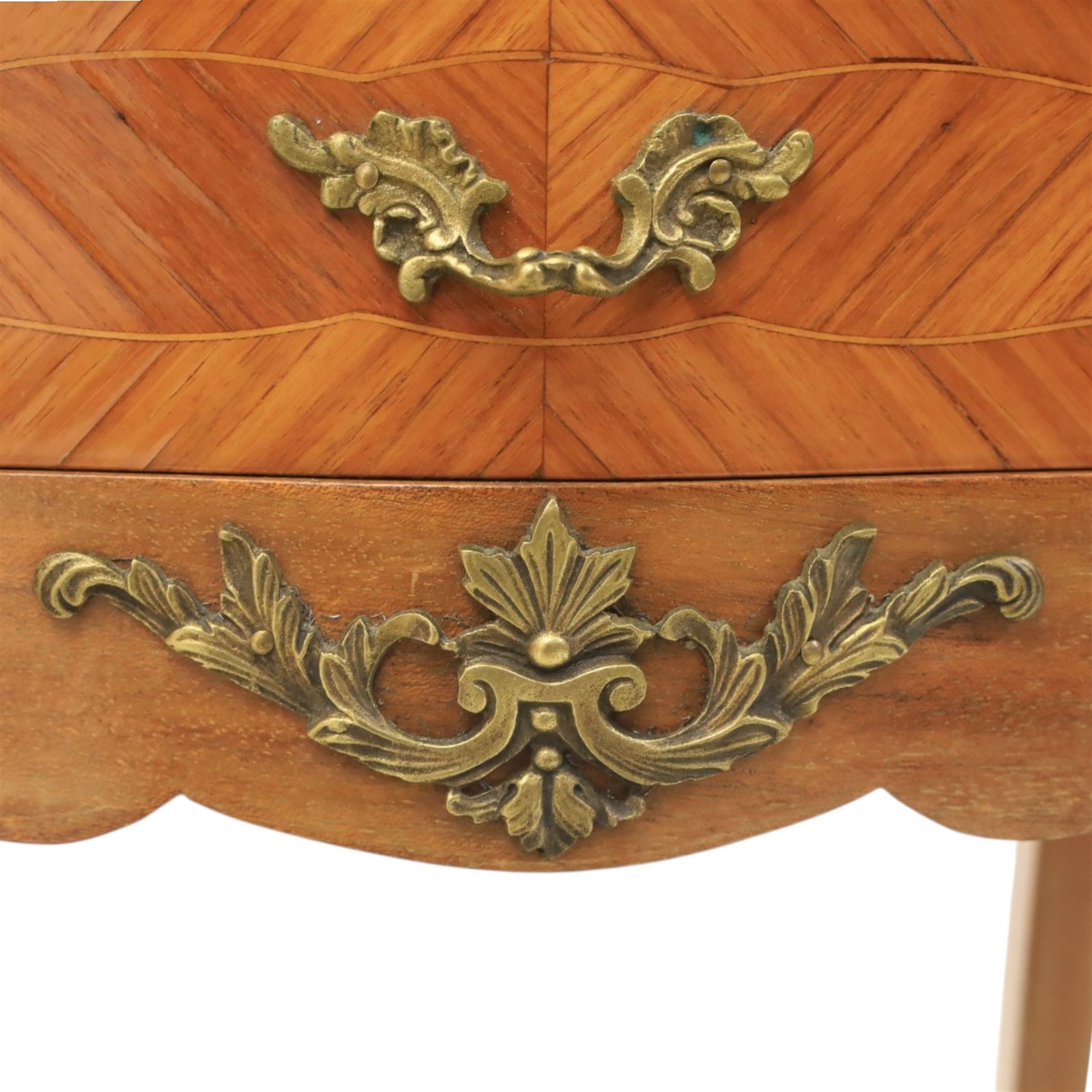 Louis XV style pair of kingwood bedside chests, each of serpentine outline with three parquetry drawers, gilt metal mounts and handles, raised on slender cabriole legs