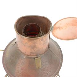 Copper ships lantern with red glass, marked NUC with brass handles and fittings, H46cm