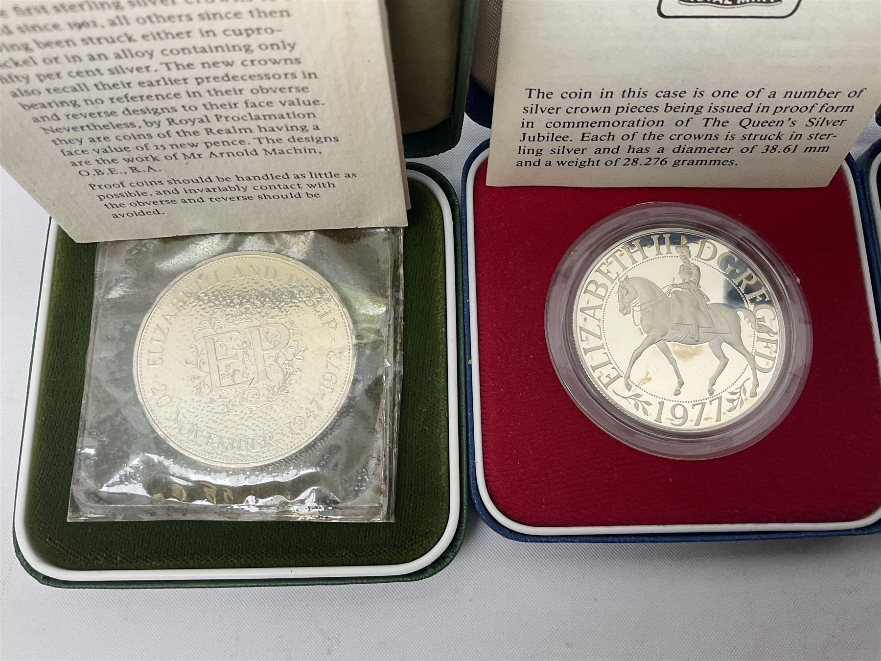 Seven The Royal Mint United Kingdom sterling silver proof crown coins, comprising two 1972, three 1977, 1981 and 1993, all cased with certificates and a Queen Elizabeth II 2001 one ounce fine silver Britannia coin on card (8)