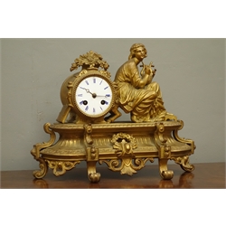  Late 19th/early 20th century gilt metal figural mantel clock, with maiden playing the harp, floral swags and scrolls, W36cm  