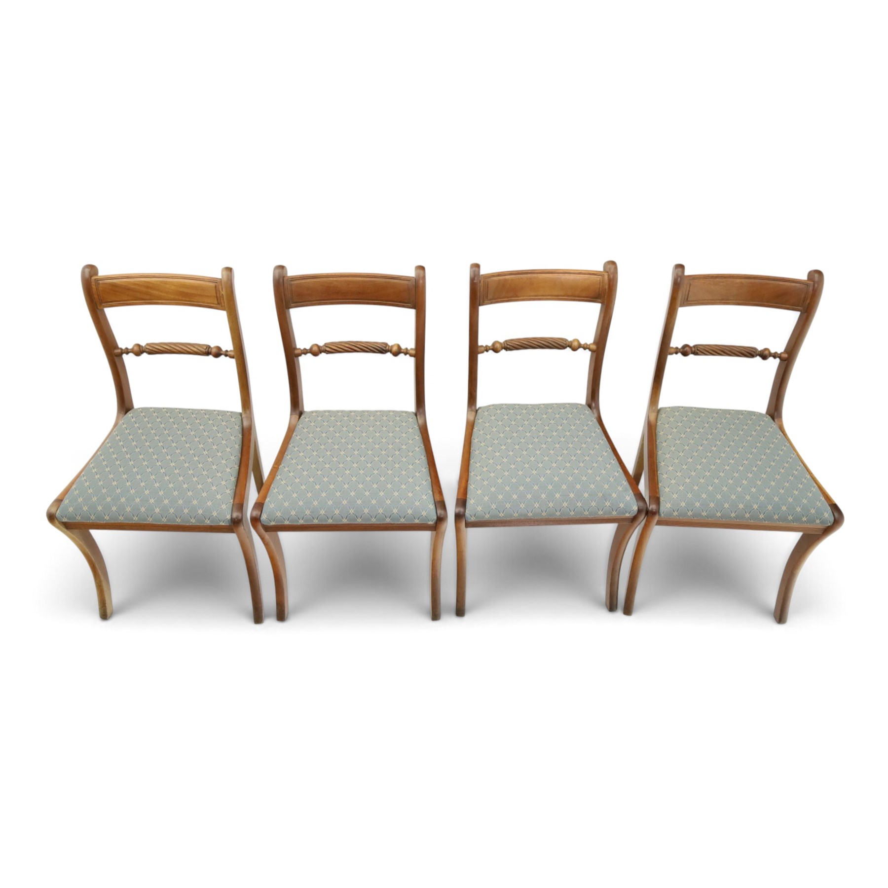 19th century mahogany extending dining table, rectangular top with rounded corners raised on turned and fluted supports with brass cups and castors, with two additional leaves; with set of eight (6+2) Regency design mahogany dining chairs, spiral-reeded back-bar over drop-in seats and sabre supports (W54cm H85cm)