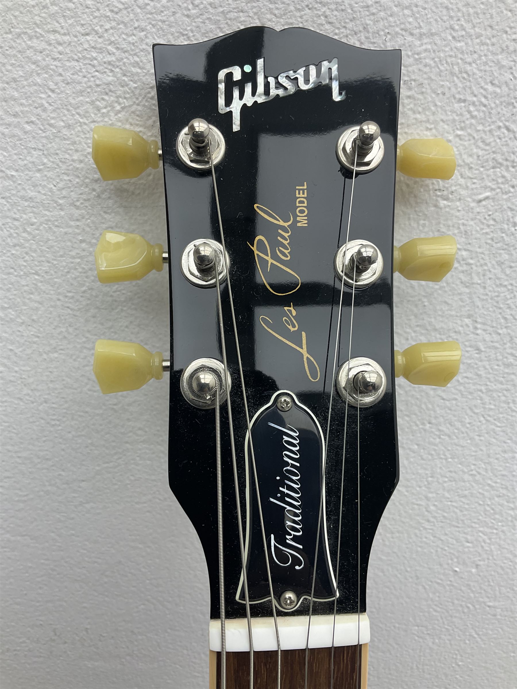 2011 Gibson Les Paul Traditional gold top electric guitar; serial number 103110461; with  mahogany back, twenty-two frets, 57 Classic humbuckers and bridge/stop bar tailpiece L100cm; in Gibson hardcase with owners manual and associated paperwork