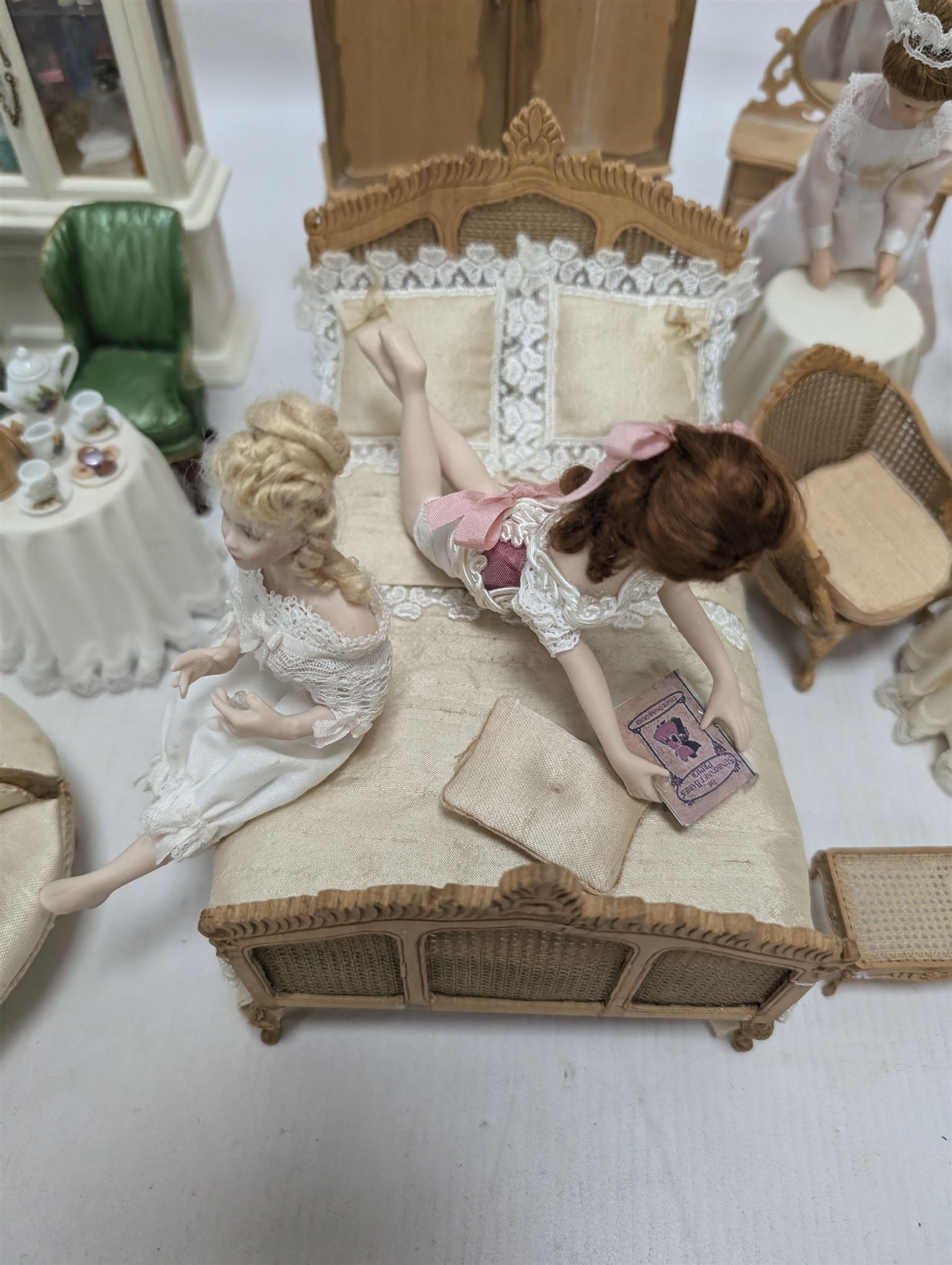 Dolls house bathroom and bedroom furniture, including bed, wardrobe, dresser filled with toiletries, shower, five figures, etc 