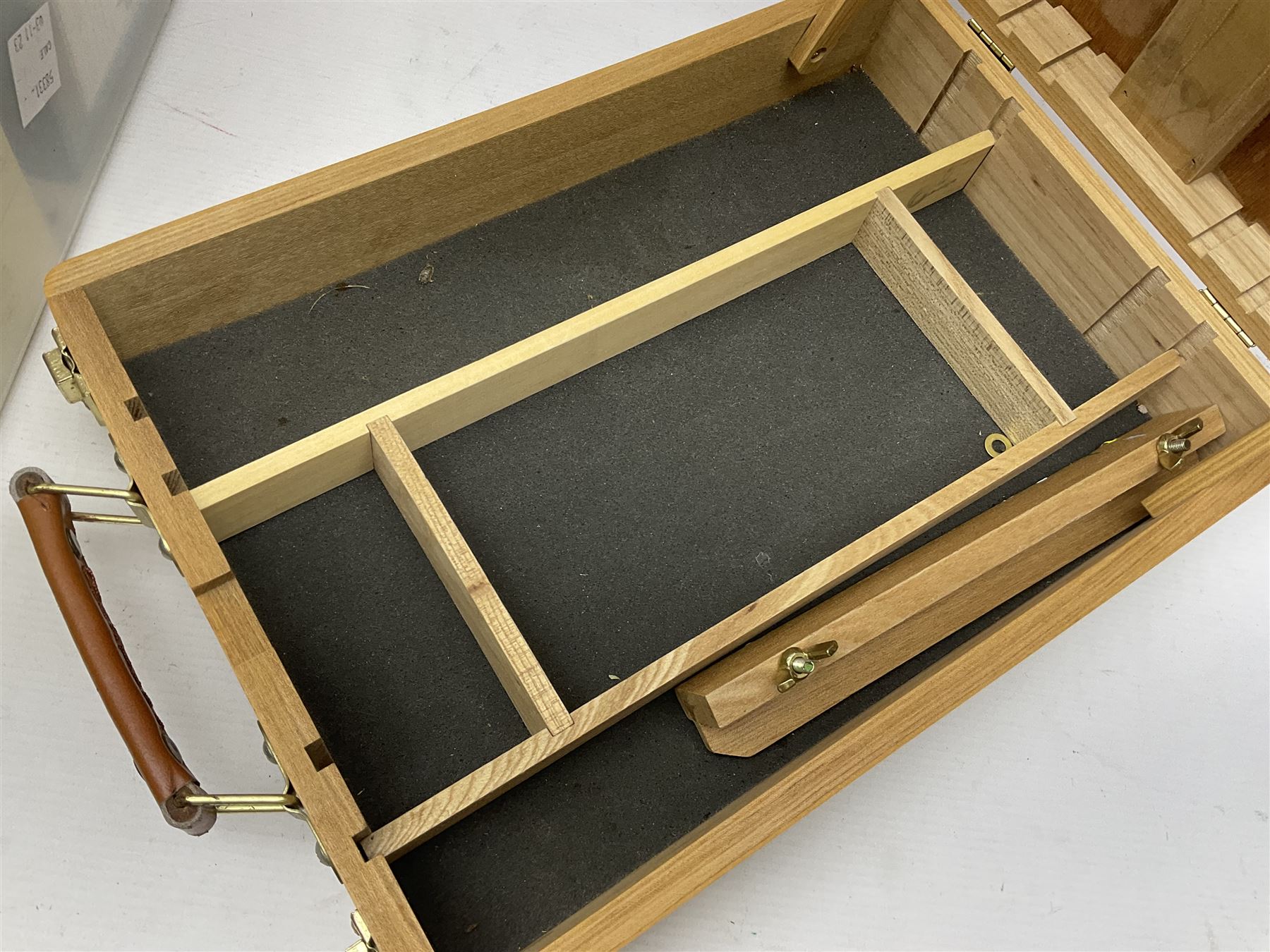 Chatsworth box easel, together with a Reeves table easel, collection of Wentworth jigsaw puzzles and two picnic baskets