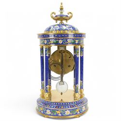 20th century- 8-day cloisonne styled rotunda clock, with six decorative enamel pillars and floral decoration to the base and top, visible pendulum with a portrait depiction of a young lady, four inch enamel dial with Roman numerals, minute markers and trefoil steel hands, twin train spring driven rack striking movement sounding the hours and half hours on a coiled gong.   