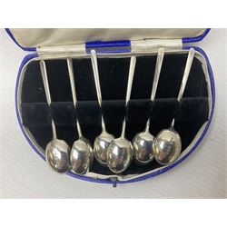 Set of six 1920's silver coffee spoons, hallmarked Sheffield, contained within a fitted case, together with a set of five George III bright cut engraved teaspoons, also cased, approximate total silver weight 77 grams