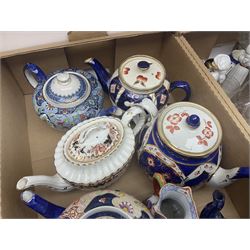 Collection of Victorian and later teapots, Oriental style English ceramics, Royal Worcester 'Friday Boy' figurine, coloured glass candle holders, two glass decanters, Victorian commemorative glass dishes, other ceramics and glassware etc, in three boxes 