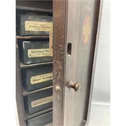 20th century first aid cabinet, fitted interior, with contents, part in labelled containers and draws, marked Thackray Leeds to the front, H62cm, D15cm, W27cm 