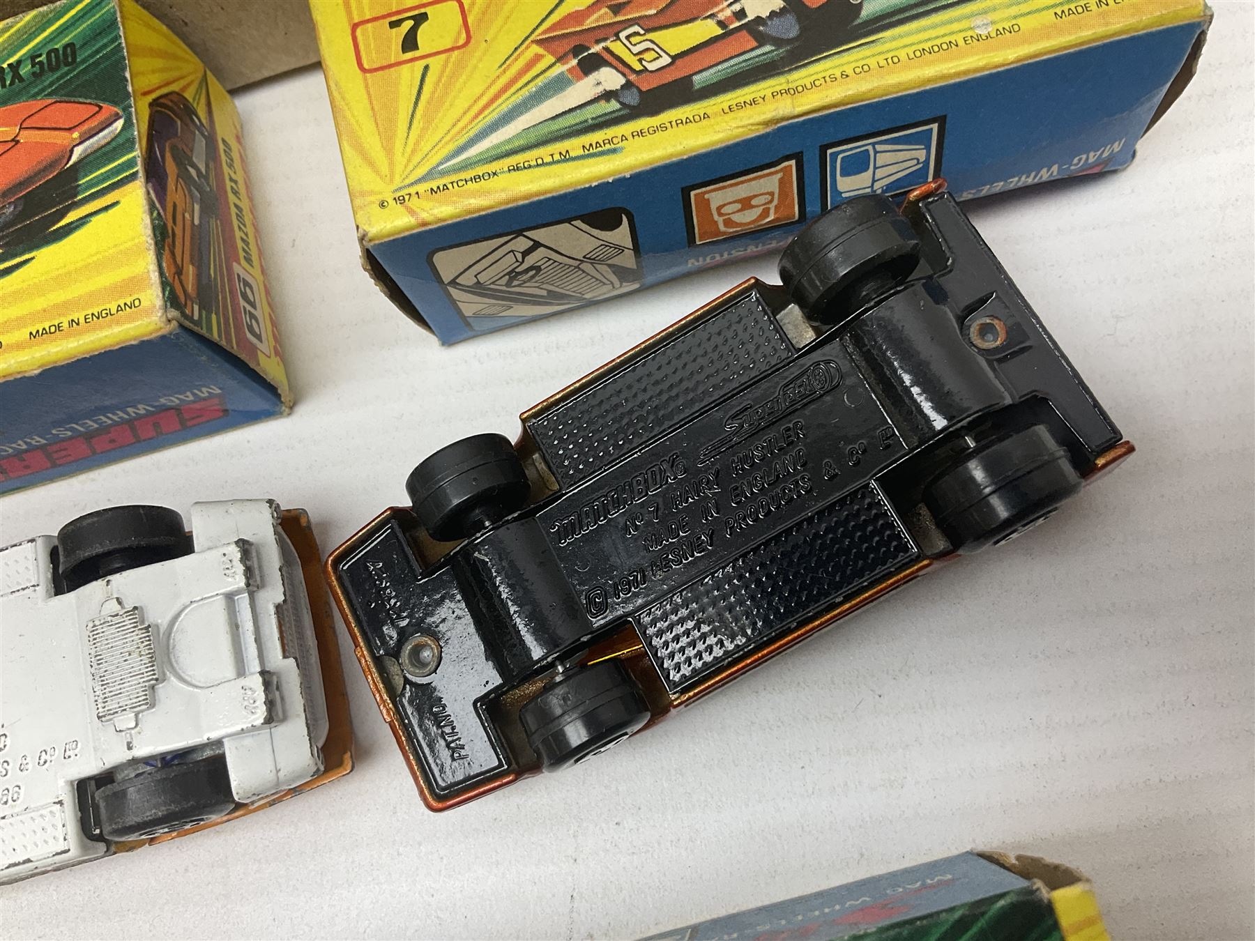 Matchbox Superfast track racing Set with Superbooster and two boxed SF-17 Slipstream Curves; together with five boxed Superfast models - 3d Monteverdi Hai, two 7d Hairy Hustler, 45c Ford Group 6 and 66d Mazda RX500; and quantity of unboxed and playworn other die-cast models