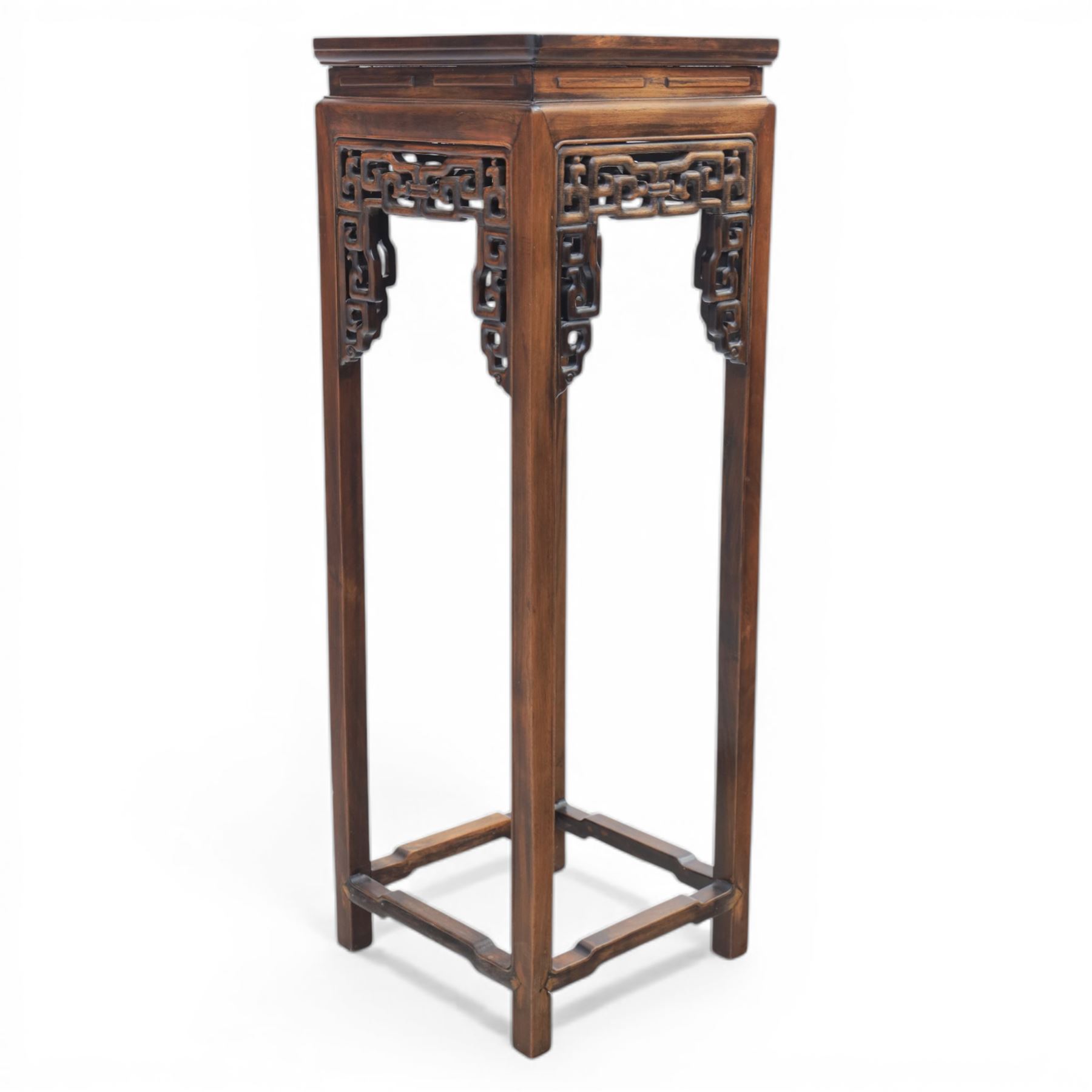 Chinese style hardwood open latticework plantstand, square top ove latticework spandrels raised on square supports united by stretchers