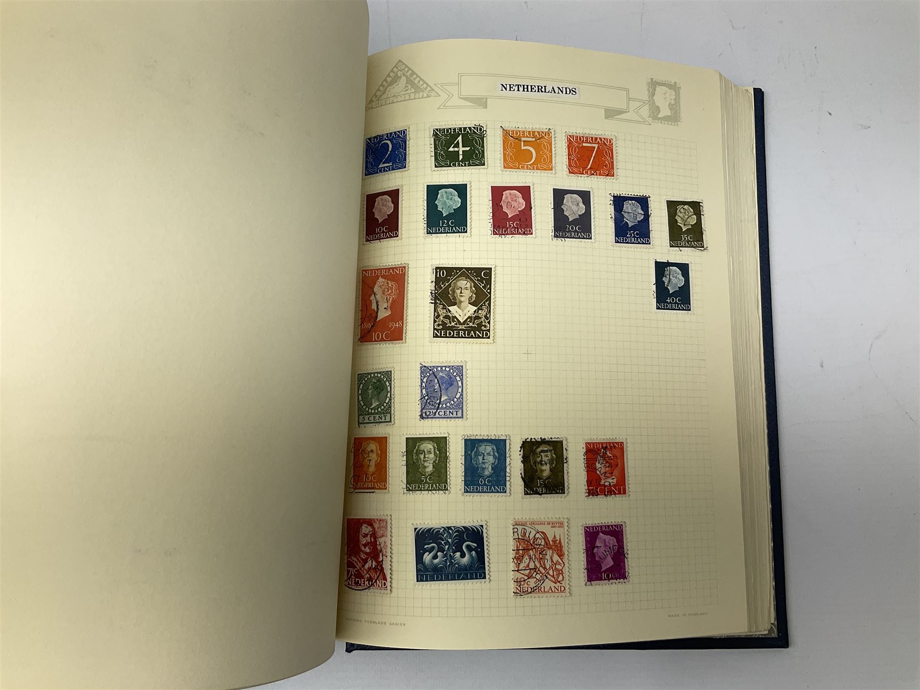 Comic postcards including Bamforth and Quip examples together with WW1 postcards, a collection of world stamps including examples from China, and other ephemera 