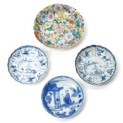 Pair of Chinese Kangxi period blue and white lobed dishes decorated with panels of fisherm...
