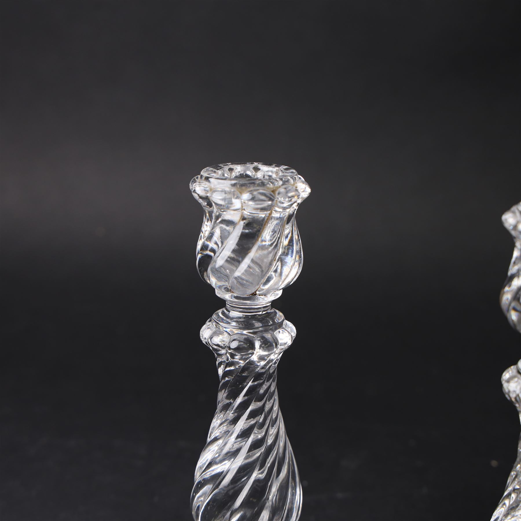 Pair of Baccarat Bambous glass candlesticks, with wrythen moulding, marked beneath, H19cm