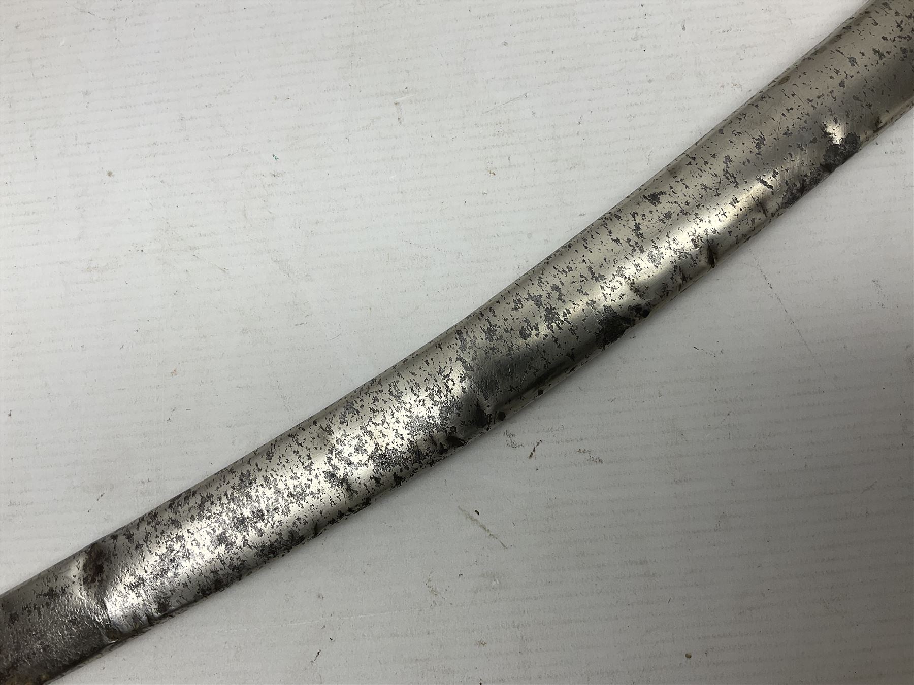 19th century Russian Imperial Navy sword, with 77.5cm curving fullered blade, brass three-bar hilt with lozenge shaped langets and wire-bound leather grip; in polished steel scabbard with one suspension ring L97cm overall