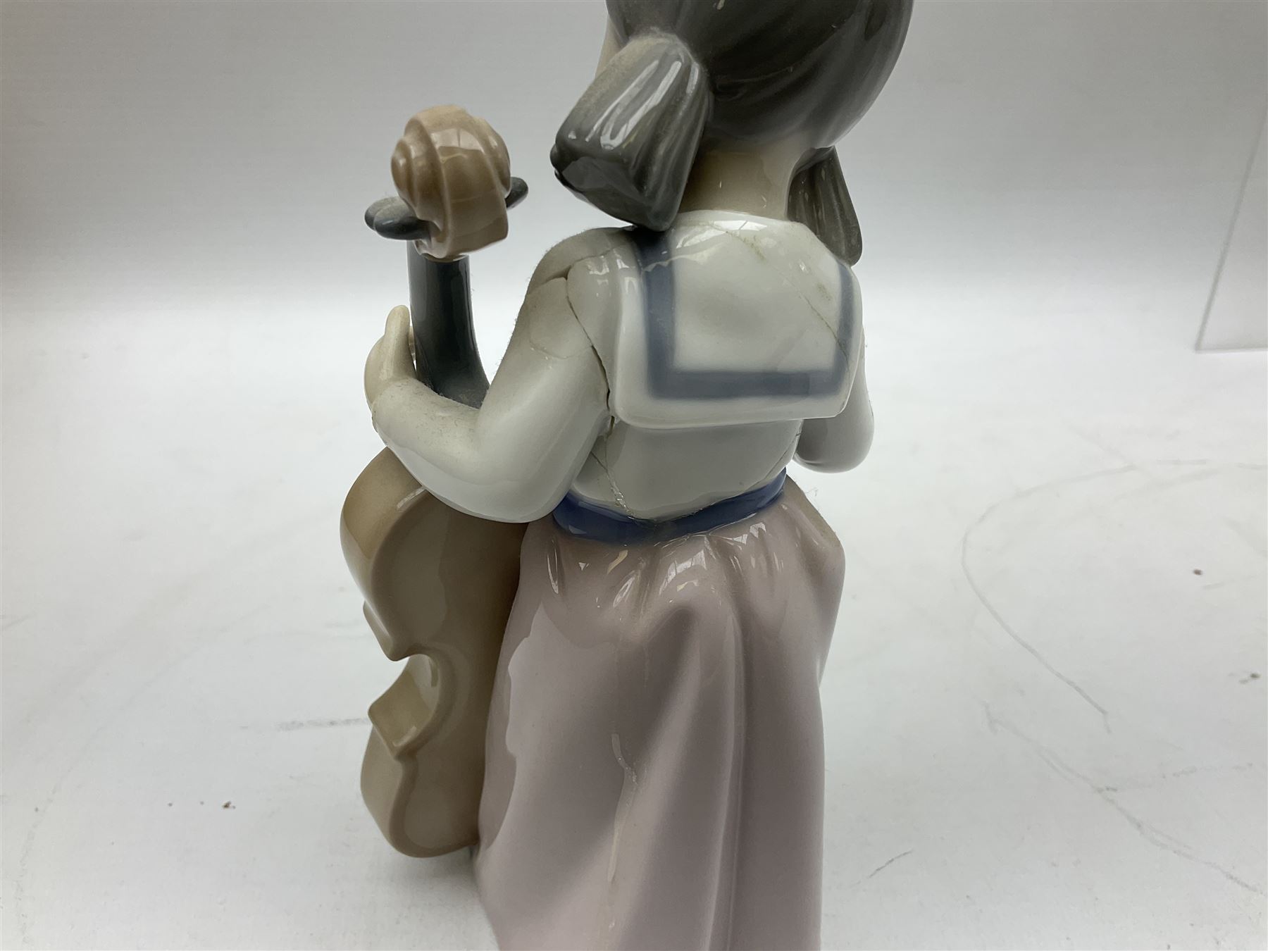 Collection of Nao figures, to include 'Moment with Mummy' no.1429, 'Stories with Grandma' no.1512, 'A Hug of Love' no.1467, together with fourteen further Nao figures and a Cascades clown figure