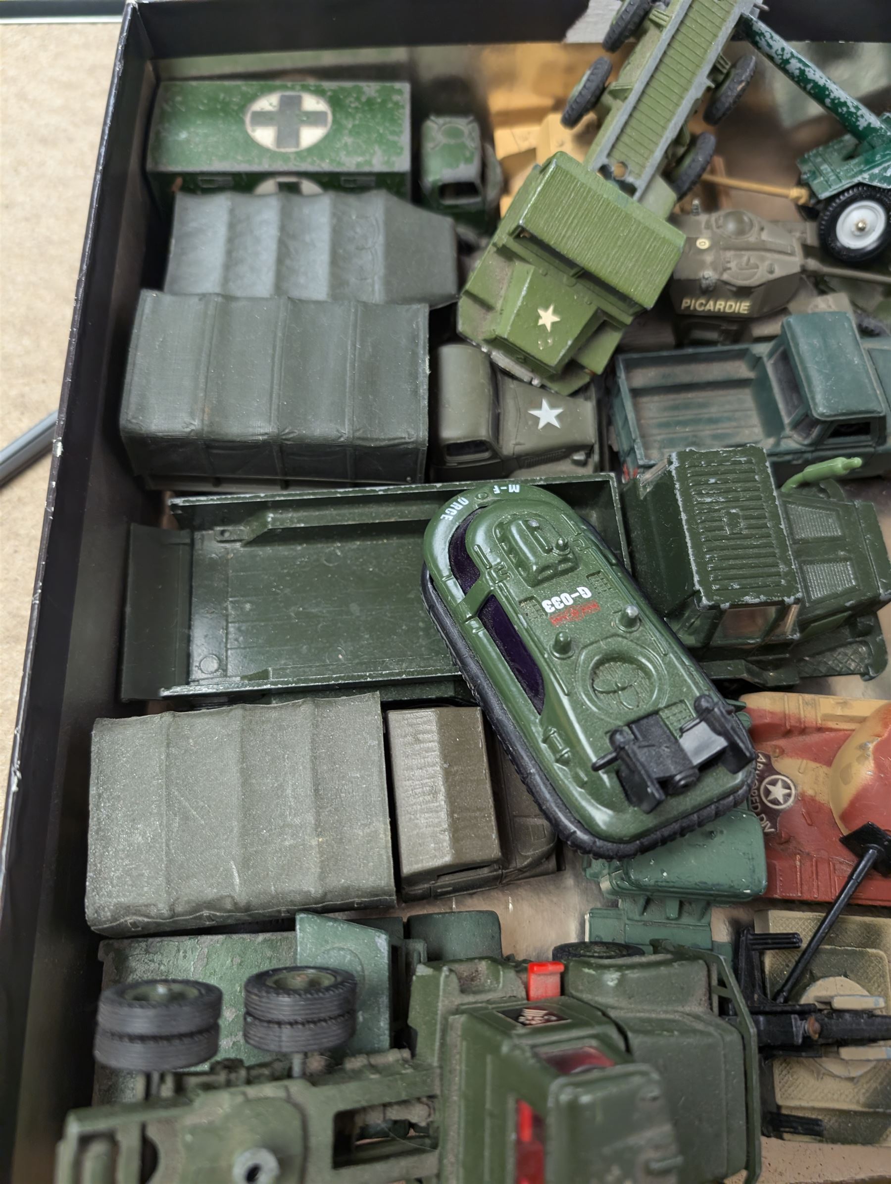 Collection of diecast military vehicles, including Dinky, Matchbox and Solido examples, mostly unboxed tanks