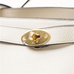 Mulberry - Islington handbag in Chalk Silky Calf leather with black piping, the structured body with single rolled top handle, gold-tone Postman’s Lock fastening and front strap detail, with detachable and adjustable shoulder strap, opening to a spacious two-division interior with Mulberry monogram fabric lining, with original Mulberry product tag, care booklet and dust bag, unused