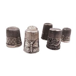 Six silver thimbles, including five sterling silver examples and one continental silver example, with decoration including butterfly and birds,  all stamped