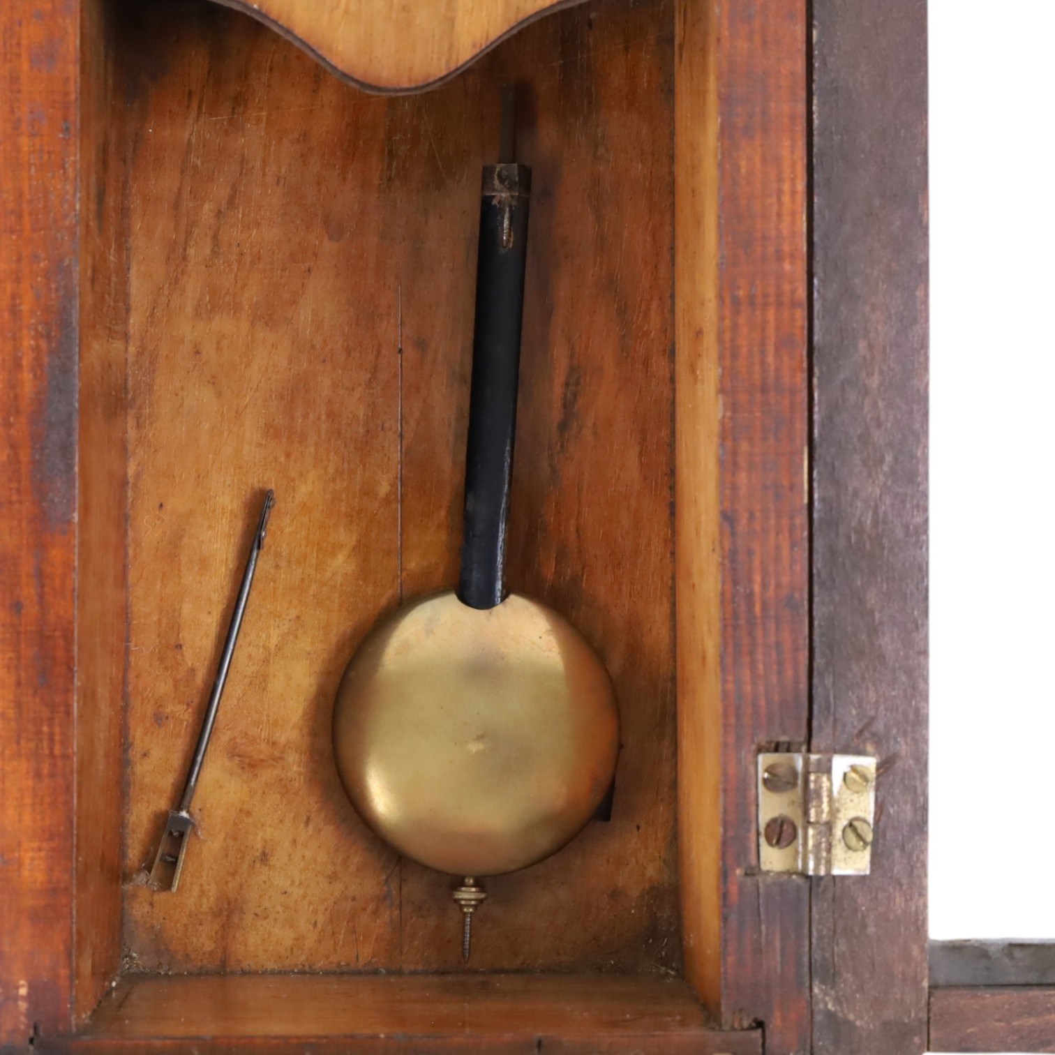 German miniature 8-day wall clock, in walnut case with gable pediment and finials, enamel dial with Roman numerals, minute track, steel spade hands and pendulum, H52cm