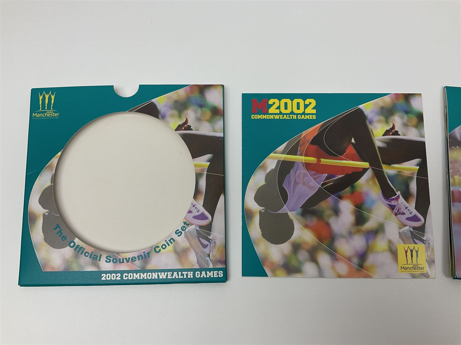 The Royal Mint Queen Elizabeth II 2002 Manchester Commonwealth Games four coin two pound coin  set in card display