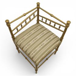 19th century Scandinavian corner chair, with rail back and sides formed with turned spindles and finial terminals, fitted with an upholstered seat in striped floral fabric, raised on turned supports united by stretchers