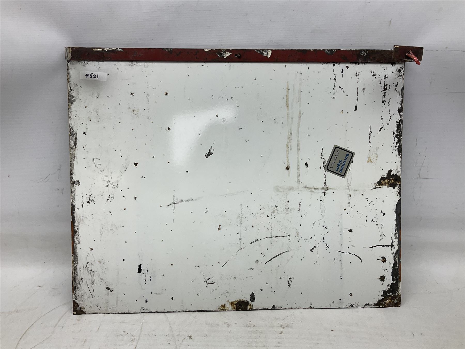 Enamel station sign for Charing Cross in red and blue on a white ground 56 x 71cm with hanging brackets