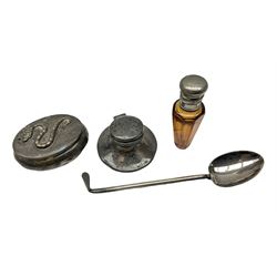 German silver pill box of oval form, the cover decorated with a serpent, stamped with crown and crescent and marked 800, together with a miniature silver capstan inkwell with glass liner, hallmarked Birmingham, a novelty silver teaspoon with golf club terminal, hallmarked Birmingham, and an amber glass scent bottle with silver plated cover, approximate weighable silver (not including inkwell or scent bottle with silver plated cover) 41.9 grams