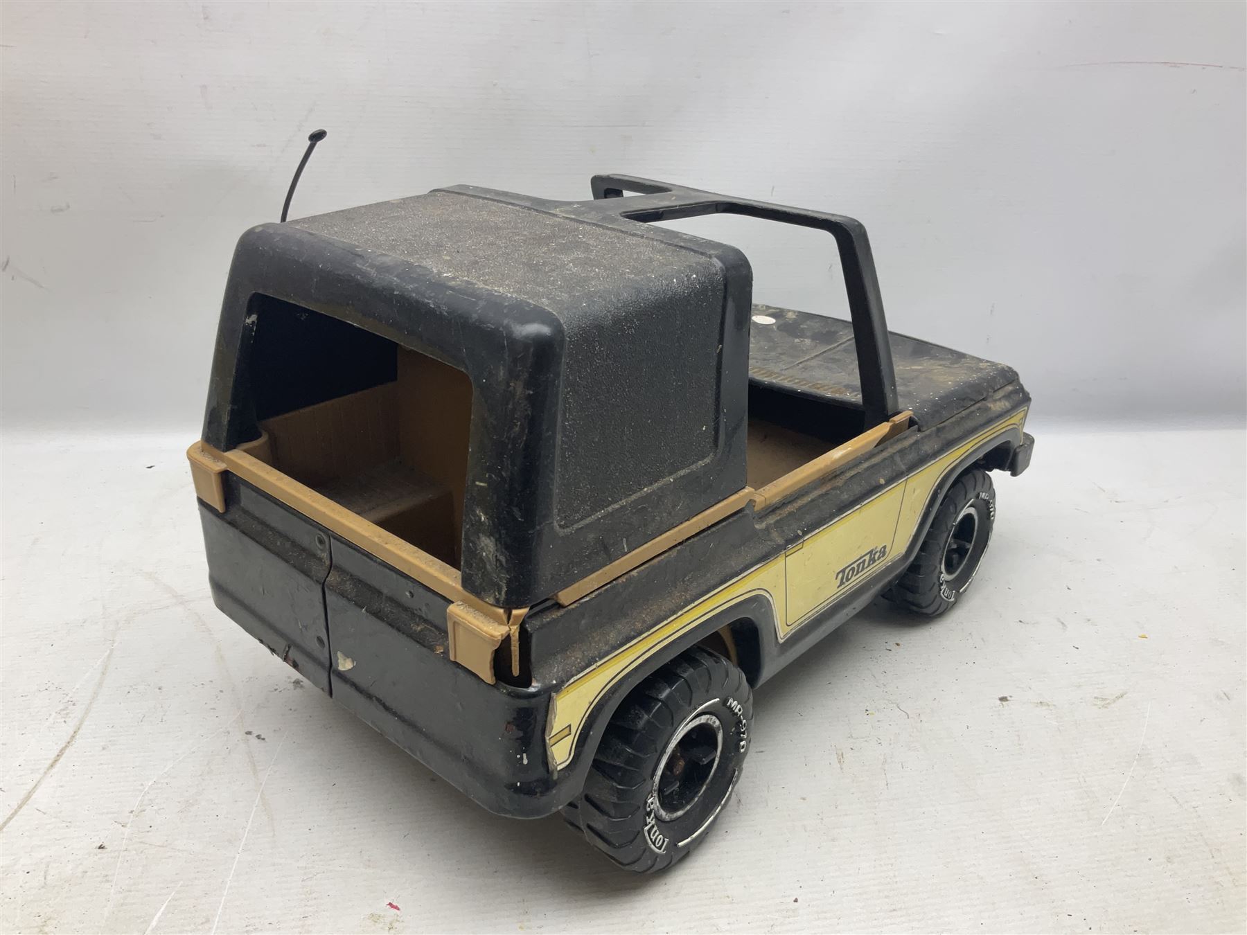 Tonka - five large scale pressed steel vehicles comprising Cement Mixer, Mighty Mobile Crane, Jeep and two Dumper Trucks (5)