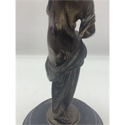 Gilt bronze figure of a lady in neo-classical dress, on a circular wooden plinth, H26cm