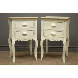  Pair painted French style bedside chests, two drawers, shaped apron, fleur de lis carved cabriole legs, W41cm, H67cm, D31cm  