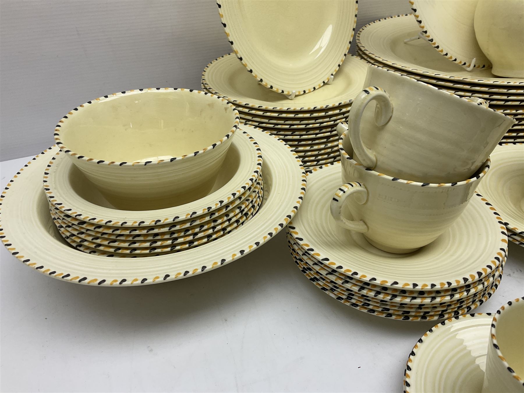 Art Deco Crown Ducal tea and dinner wares, reg no. 784158, comprising dinner plates, teacups, saucers, coffee cups, crescent shaped side plates, bowls, eggcups, etc, (93)