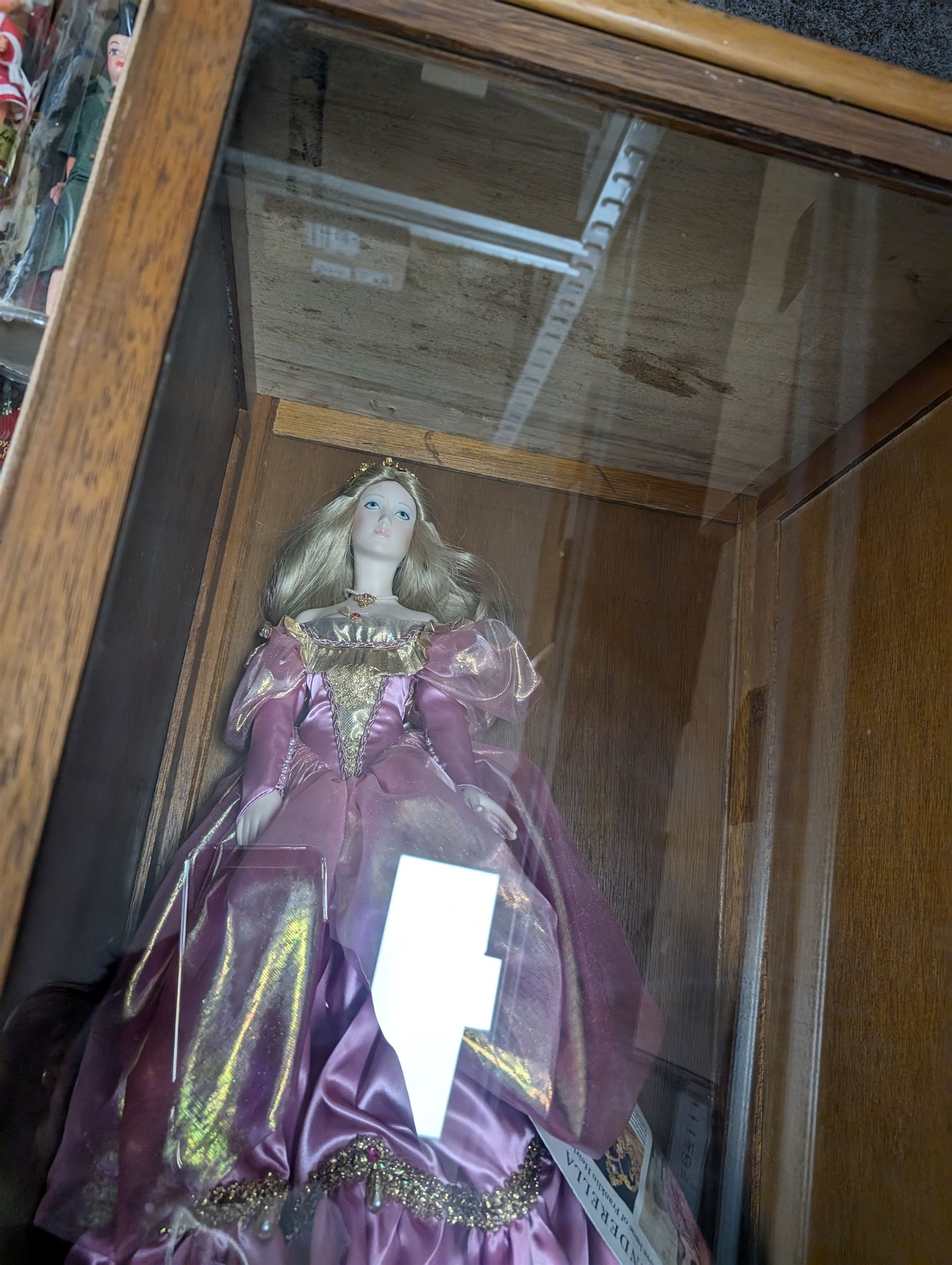 Franklin Heirloom doll, Cinderella, in wooden display case, together with a collection of 'Dolls of the World' and similar