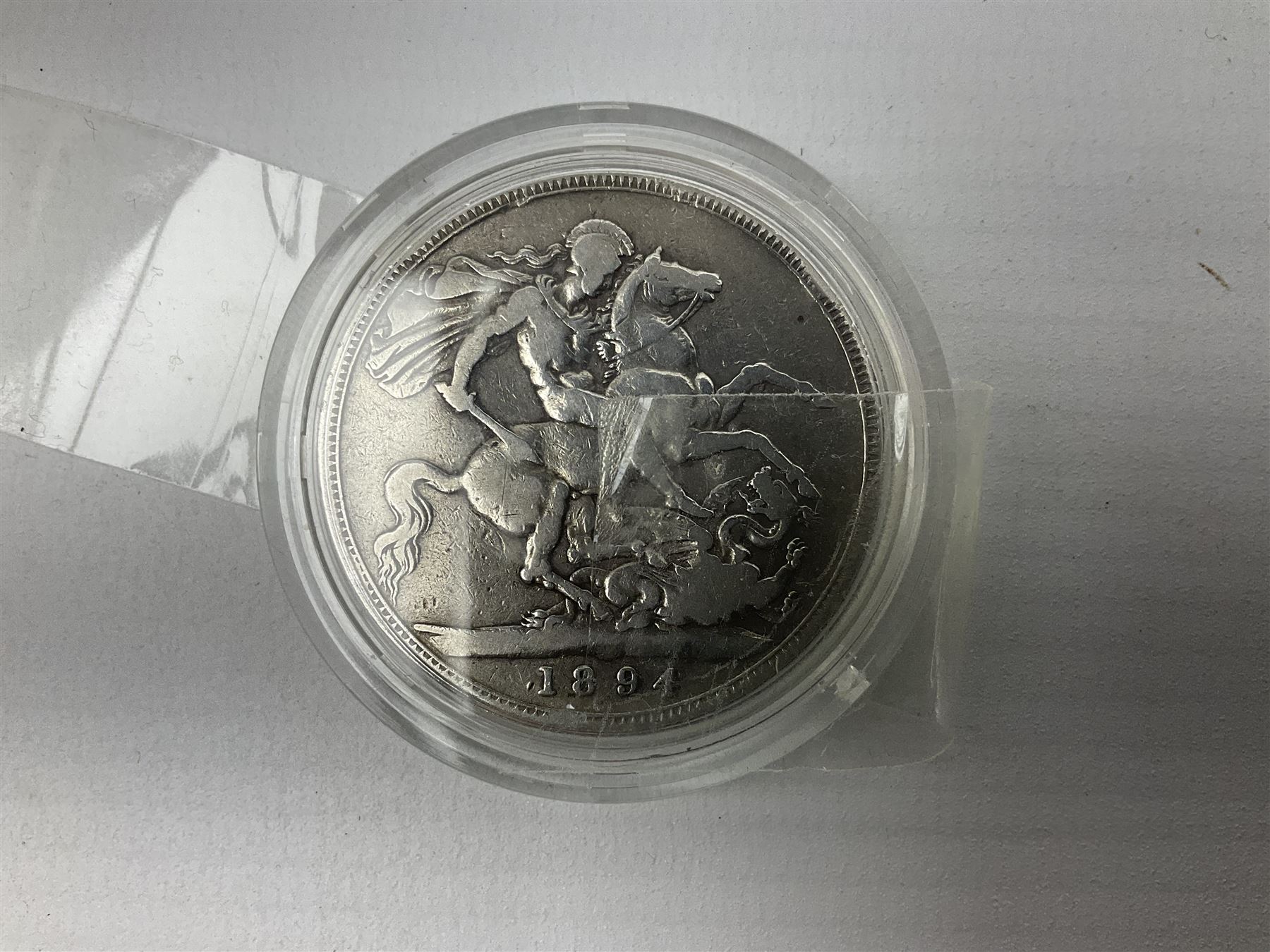 Charles I 1625 hammered silver sixpence, Queen Victoria 1894 crown coin and a cased hallmarked silver medal for the Hull photographic society, engraved '1940' 'Leonard Vokes', all housed in a red Pobjoy Mint coin box