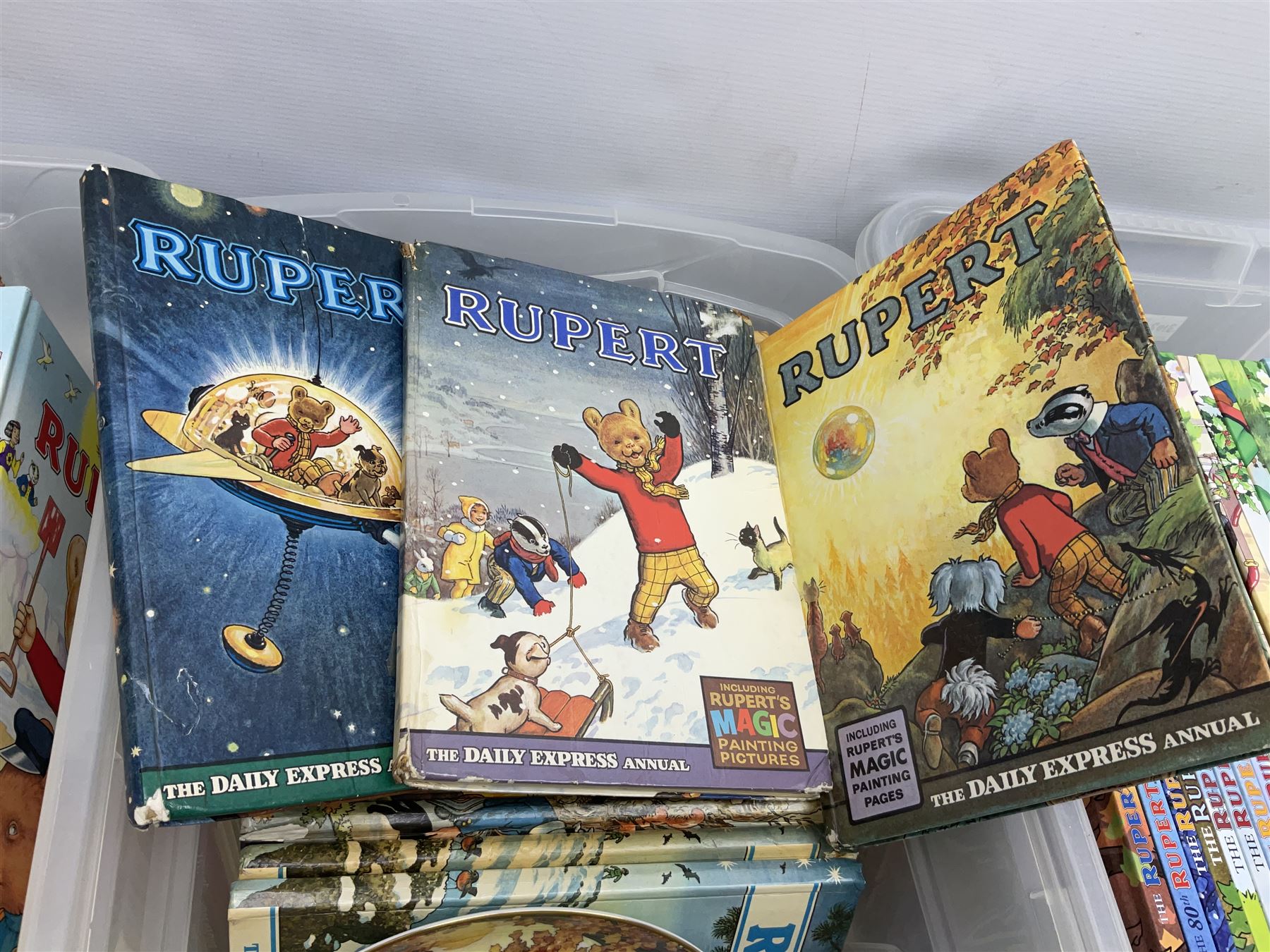 Sixty-eight Rupert Bear Annuals; almost complete run 1954 - 2016, lacking 1960/73/74; some duplicates/triplicates; together with a Wedgwood Rupert Bear Collector's plate (69)