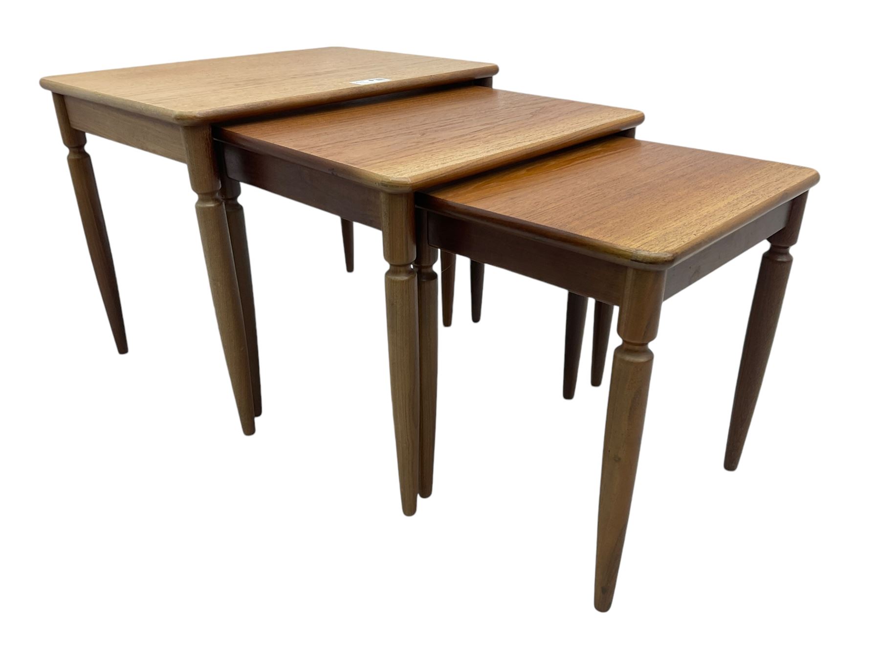 G-Plan - teak nest of three tables, rectangular top raised on turned supports