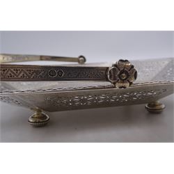 Victorian silver swing handled basket, of octagonal form, the sides pierced and engraved with foliate and star motifs, upon four compressed and beaded bun feet, hallmarked Walter & John Barnard, London 1891, W26cm, approximate weight 20.17 ozt (627.3 grams)