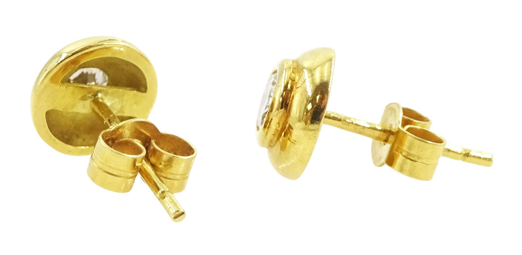 Pair of 18ct gold bezel set, round brilliant cut diamond stud earrings, Sheffield 1994, total diamond weight approx 0.40 carat